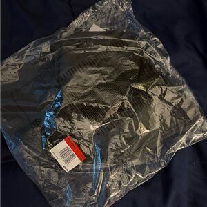 Brand new. Nike black bucket hat. Size L/XL